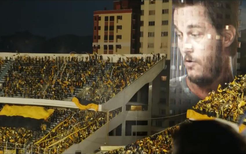 Travis Fimmel’s image projected onto a stadium