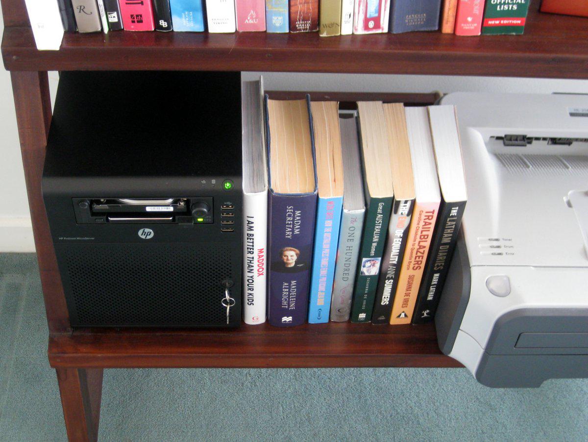 The NAS on a self next to books